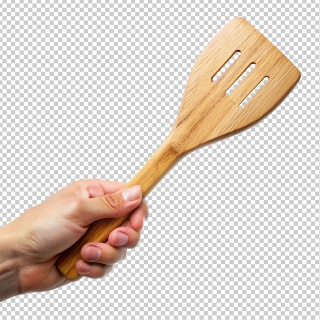 PSD wooden kitchen spatula in hand transparent background