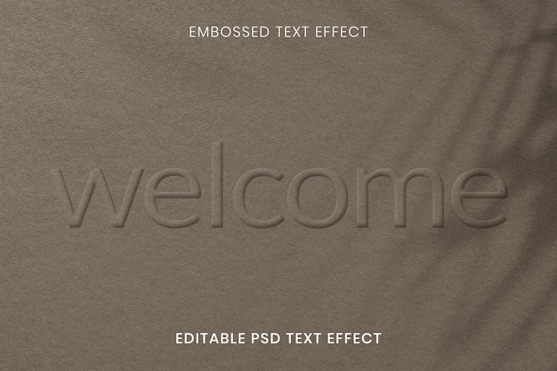 PSD word embossed editable psd text effect on brown