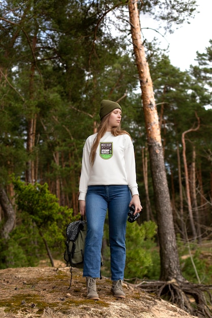 Young adult wearing forest apparel tshirt