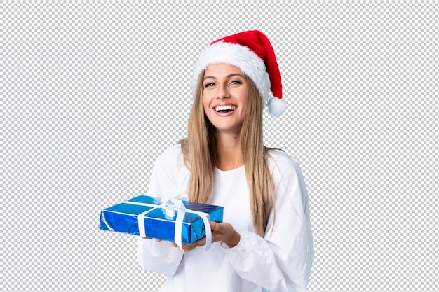 Young blonde woman holding a gift