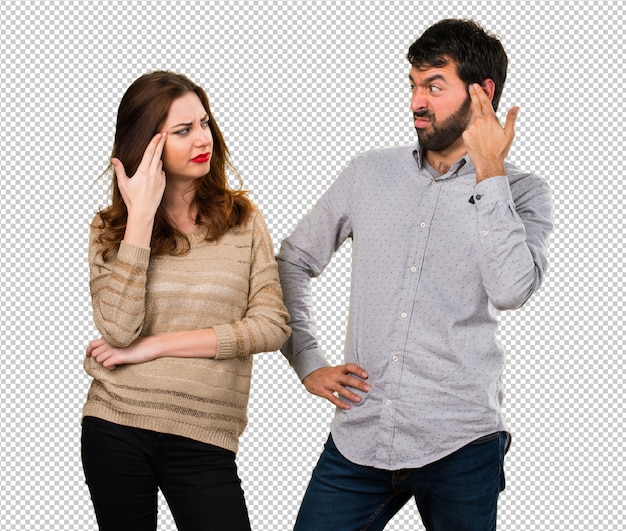 Young couple making suicide gesture