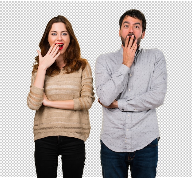 Young couple making surprise gesture