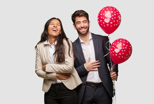 Young couple in valentines day laughing and having fun