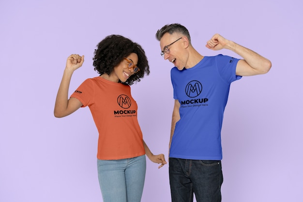 Young couple wearing t-shirt mockup