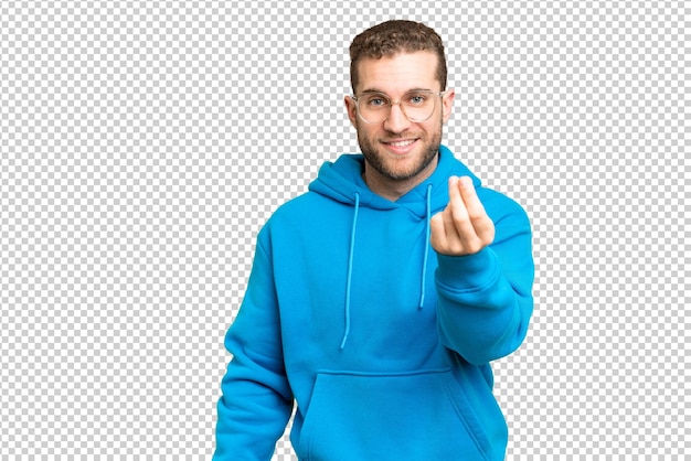 PSD young handsome blonde man over isolated chroma key background making money gesture