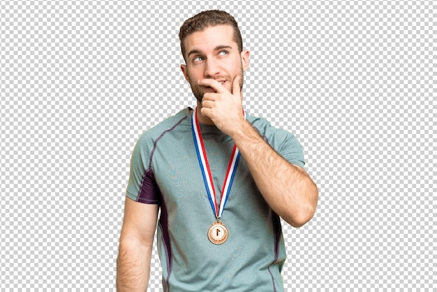 PSD young handsome blonde man over isolated chroma key background