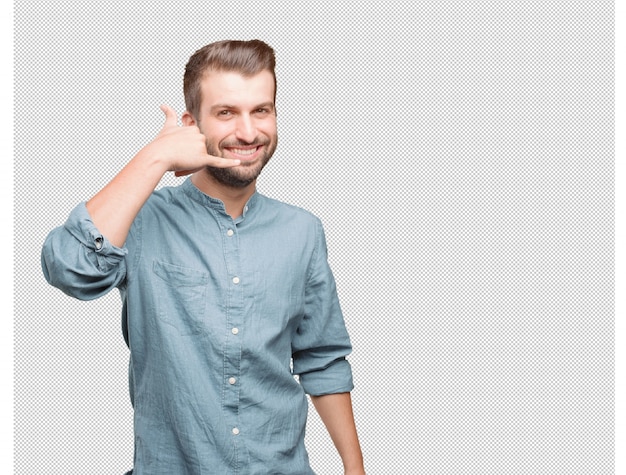 Young handsome man doing call gesture