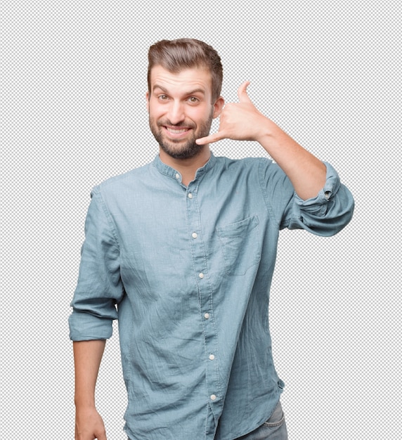 Young handsome man doing call gesture