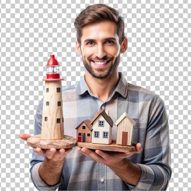 PSD a young handsome man holds wooden houses and a light transparent background