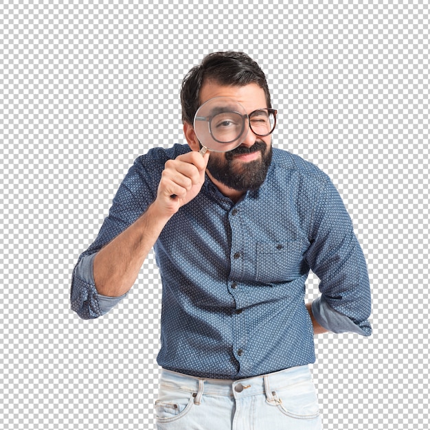 PSD young hipster man with magnifying glass