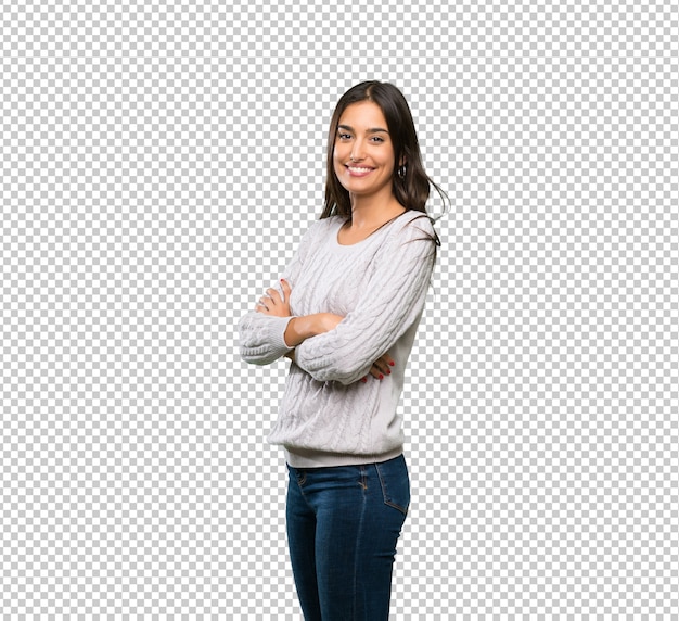 Young hispanic brunette woman with arms crossed and looking forward