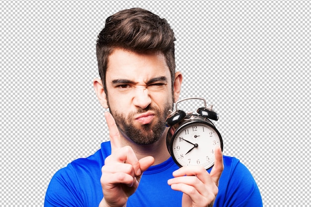 PSD young man holding an alarm clock