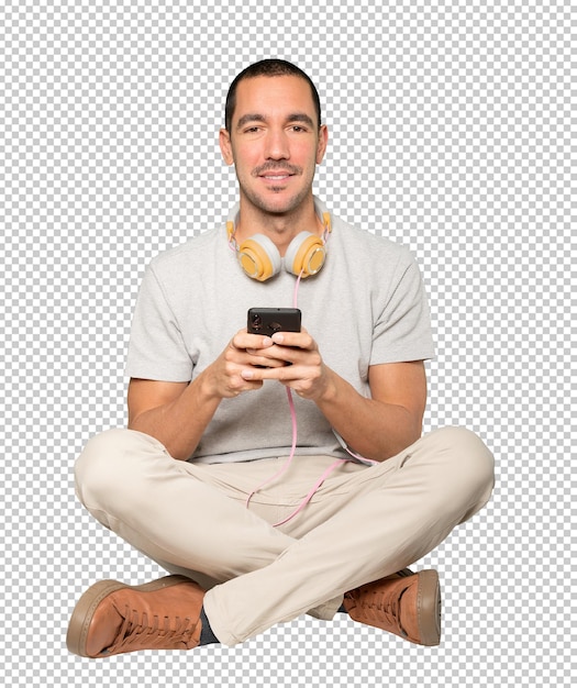 Young man in sitting position with a satisfaction gesture