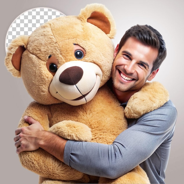 PSD young man smiling and hugging teddy bear on transparent background