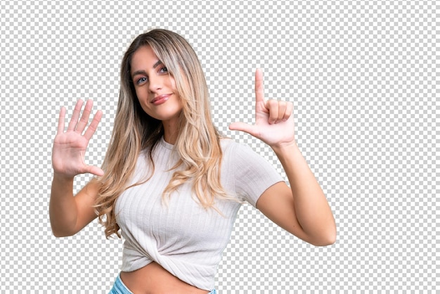 PSD young uruguayan woman over isolated background counting seven with fingers