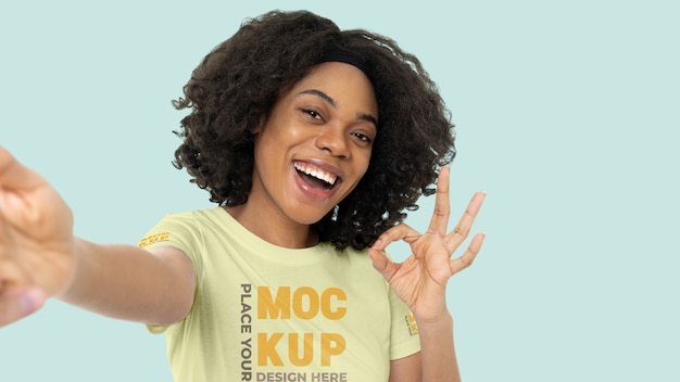 Young woman wearing t-shirt mockup