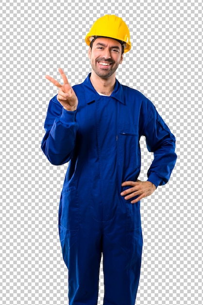 Young workman with helmet smiling and showing victory sign with a cheerful face