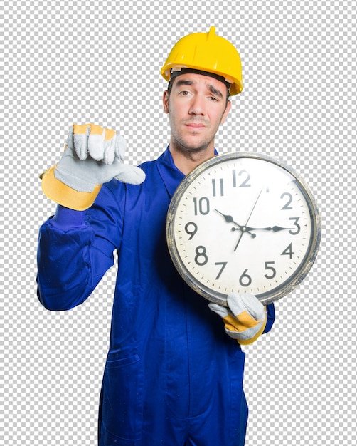 PSD young workman worried about the time on white background