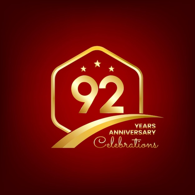 92 years anniversary inside of gold hexagon and curve with red backgrounds