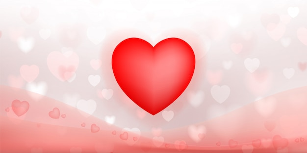 Abstract background of red heart with light blurred bokeh.