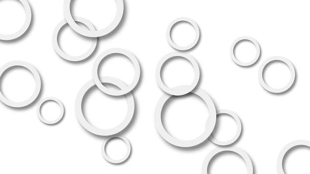 Abstract illustration of randomly arranged gray rings with soft shadows on white background