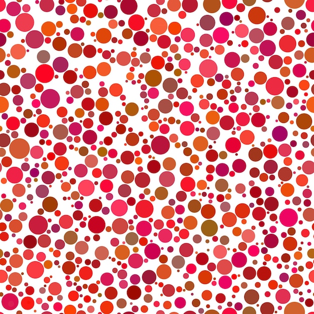 Abstract seamless pattern of circles of different sizes in red colors