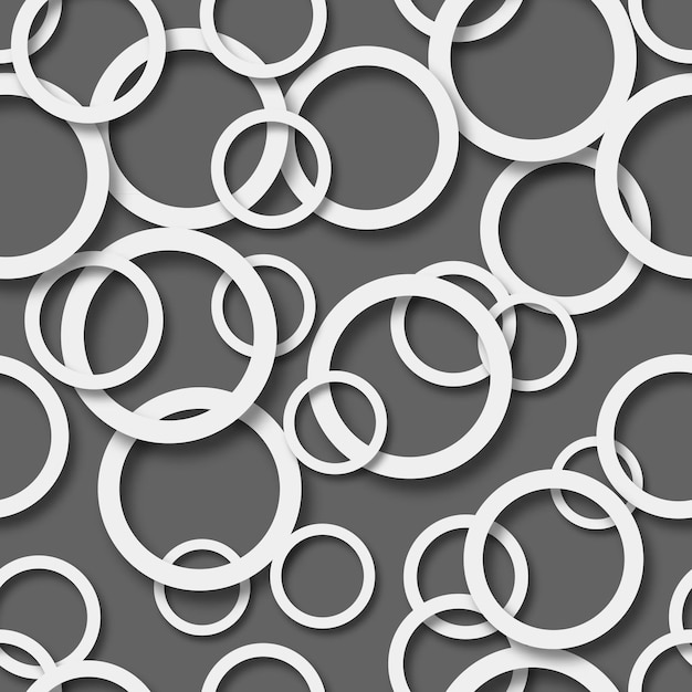 Abstract seamless pattern of randomly arranged white rings with soft shadows on black background