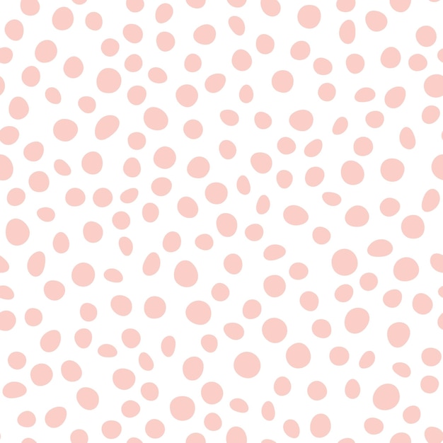 Abstract spotted seamless pattern in pastel colors Pink dotted background