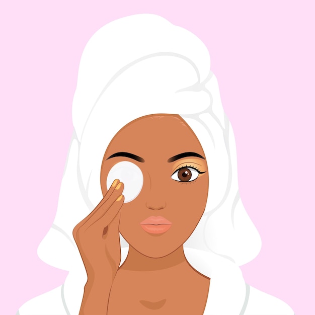 African girl Removing Makeup from Her Face with Cotton Pad, skincare make up concept, cleaning face