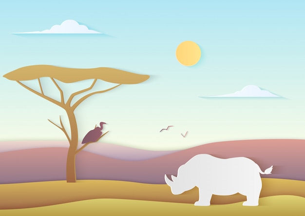 African landscape with rhino and tree standing with bird in savannah with mountains. Trendy paper cuted illustration of nature of africa.