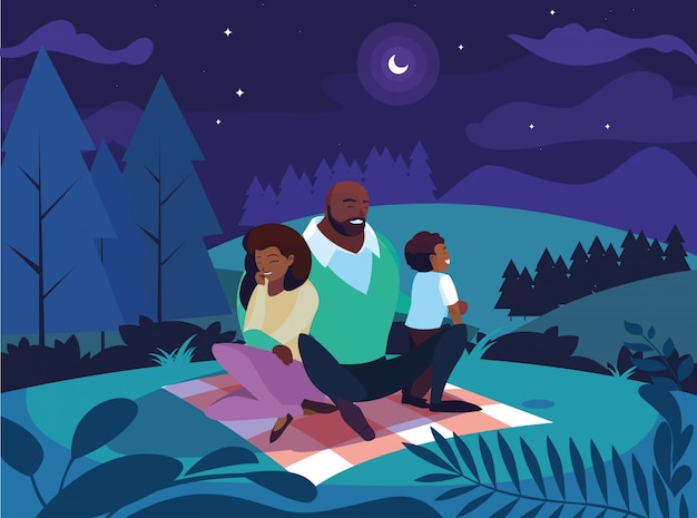 Afro parents with son family in night landscape natural