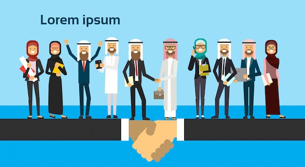 arabic businessman shaking hands in business and traditional clothes full length business agreement and partnership concept