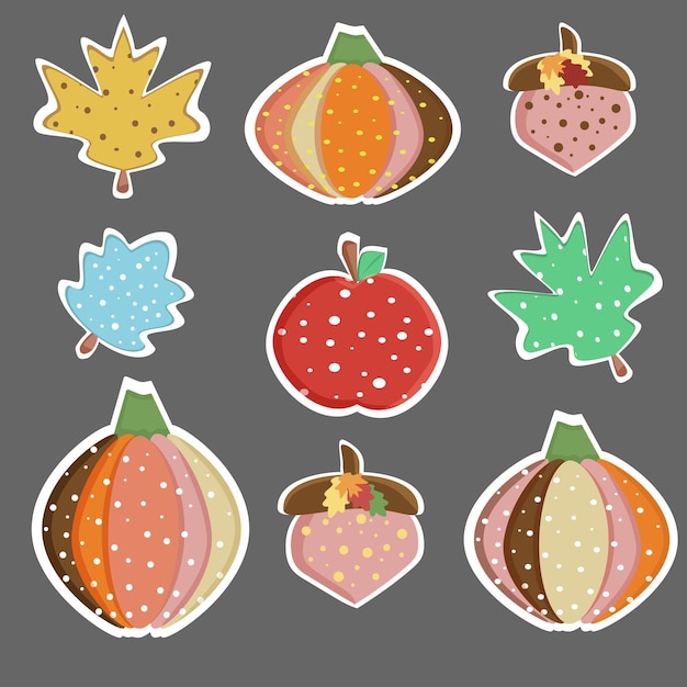 Autumn set. Leaves, pumpkins, acorns and an apple with polka dots.