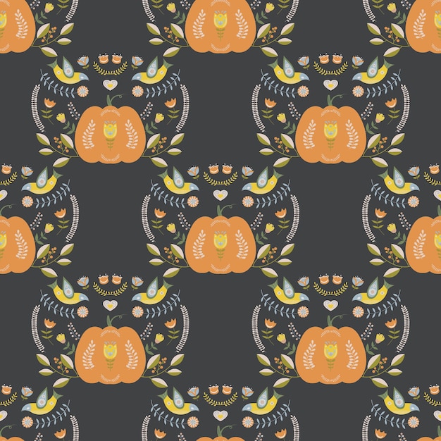 Autumnal folk seamless pattern with pumpkins birds and floral motifs