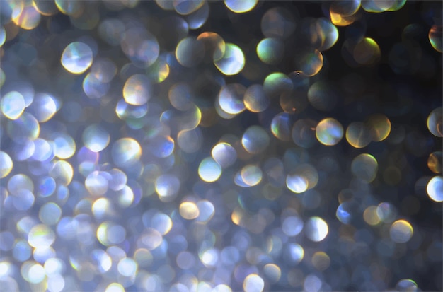 Vector background of abstract glitter lights blue gold and black de focused