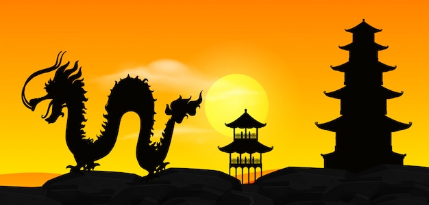 Background scene with silhouette chinese dragon at sunset