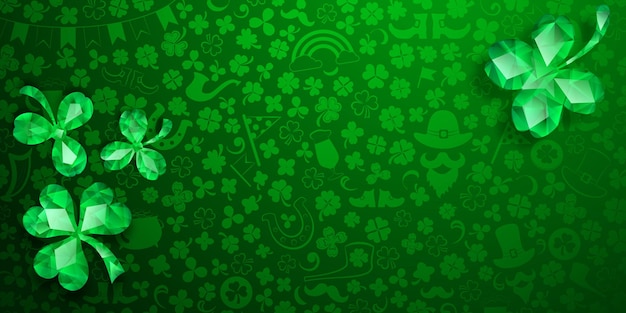 Background on St. Patrick's Day made of crystal clover leaves and other symbols in green colors