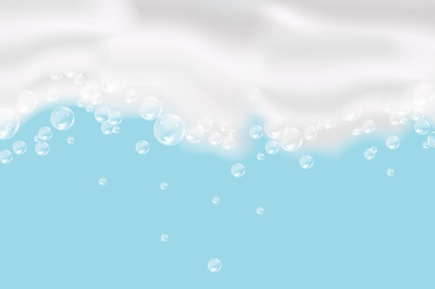 Bath foam isolated on blue background. Shampoo bubbles texture.