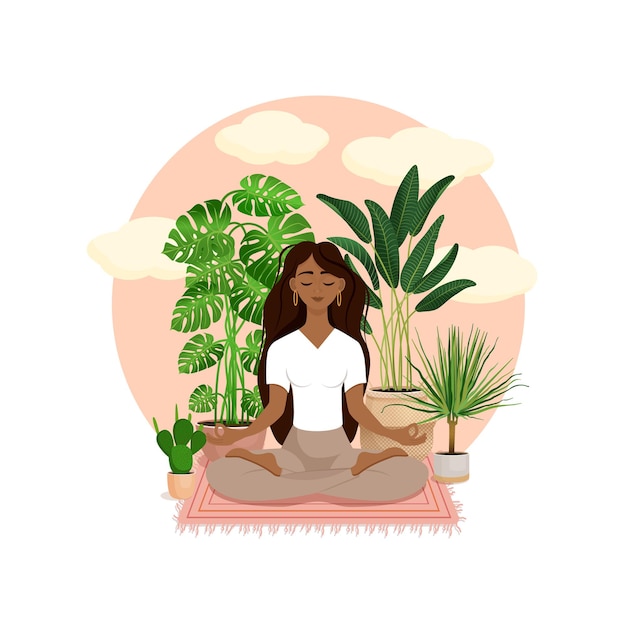 Beautiful African American brunette girl in a lotus pose surrounded by plants