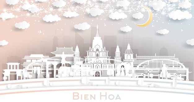 Bien Hoa Vietnam City Skyline in Paper Cut Style with White Buildings Moon and Neon Garland