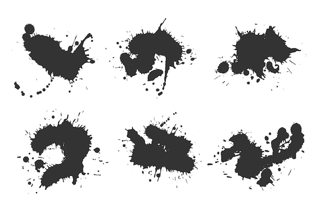 Black ink spatter and drops black spots of paint on a white background