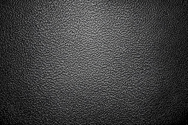 a black metallic background with a silver texture that says b amp w