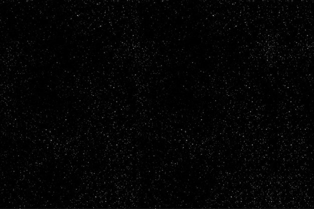 Black texture with microrelief and glitter similar to the night sky with stars