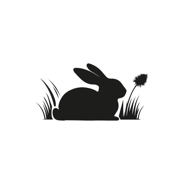 a black and white drawing of a rabbit in the grass