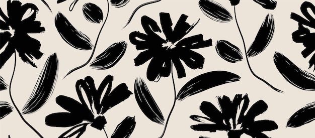 A black and white floral pattern with a leaf and a flower on it