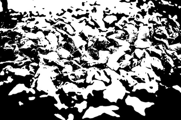 A black and white image of rocks and snow.