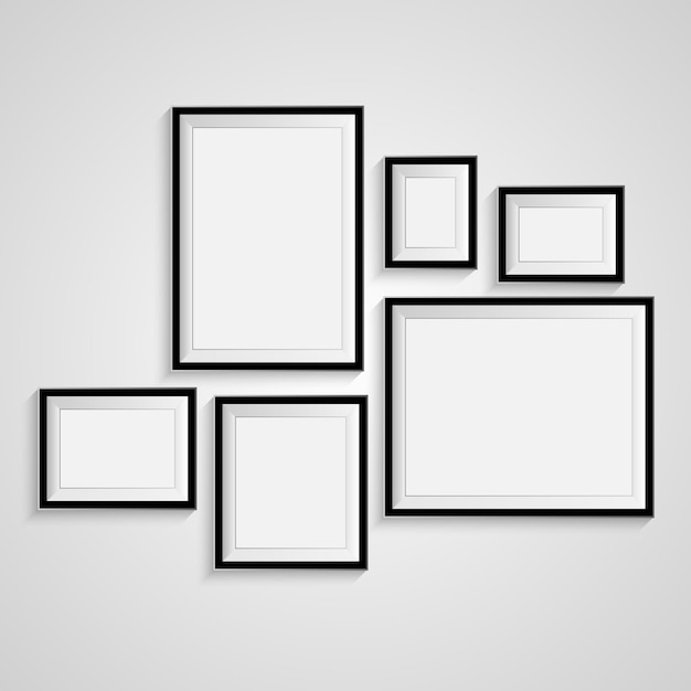 Blank picture frame template set isolated on wall