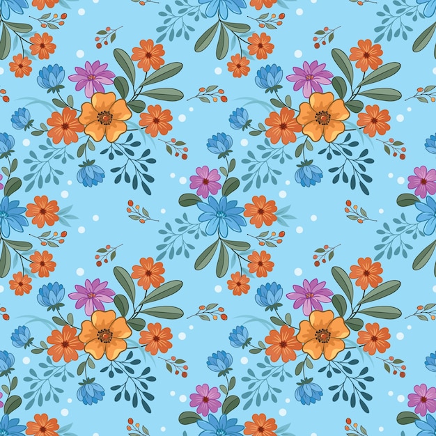 Blooming colorful flowers on blue color seamless pattern can be use for fabric textile wallpaper