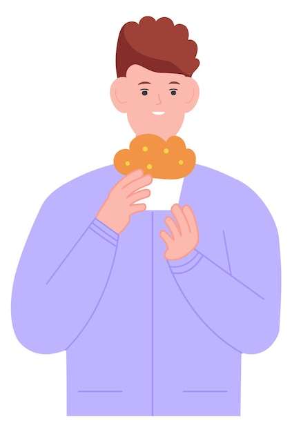 Boy eating muffin Young man with sweet bakery