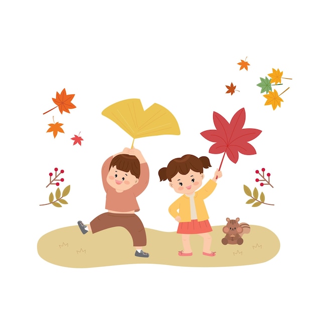 Boy and girl playing with a leaf and a teddy bear